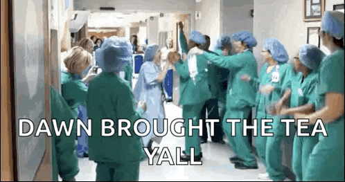 a group of nurses are dancing in a hallway with the caption dawn brought the tea y'all