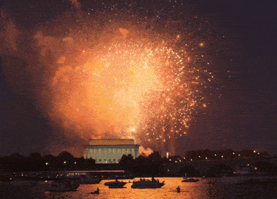fireworks are displayed over the washington monument