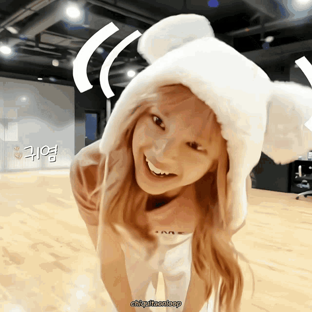 a picture of a girl wearing a white hat with the hashtag chiquitaenleap on the bottom right