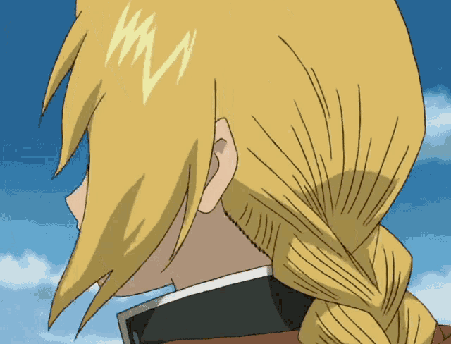 a close up of a person 's hair with a lightning bolt on the back