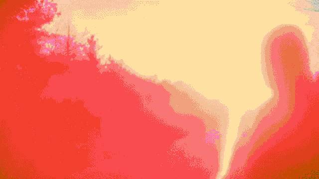 a silhouette of a person is standing in front of a red and yellow background .