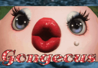 a close up of a doll 's face with red lips and the words " gorgeous "