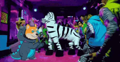 a group of people are dancing in a room with a zebra and a dinosaur