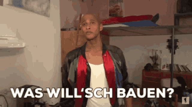 a man standing in a room with the words was will ' sch bauen on the bottom