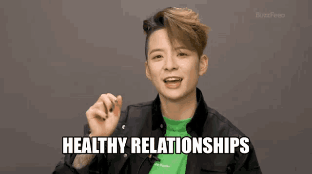 a man in a black jacket and green shirt says healthy relationships