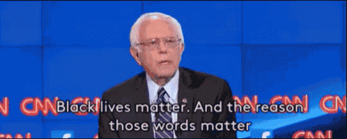 a man in a suit and tie is talking on cnn