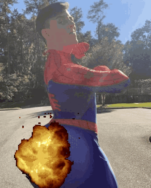 a pixel art of a man in a spider man costume