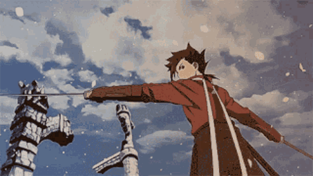 a man in a red jacket is holding a sword in front of a statue
