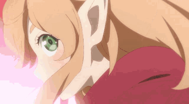 a close up of a girl with green eyes and ears