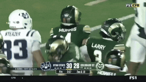 a football game is being played between utah state and colorado st.