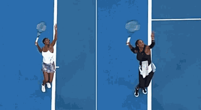 a woman is playing tennis on a blue court