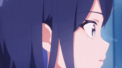 a close up of a girl 's face with blue hair and blue eyes
