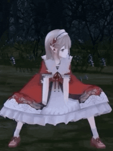 a girl in a red cape and white dress is squatting down in a forest .
