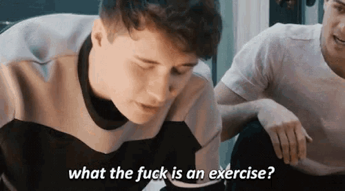a man is sitting next to another man and asking what the fuck is an exercise .