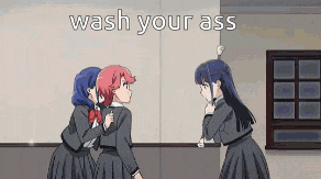 three anime girls are standing next to each other in a room with the words `` wash your ass '' written on the wall .
