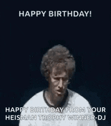 a man is covering his eyes with his hands and says `` happy birthday from your heisman trophy winner - dj '' .