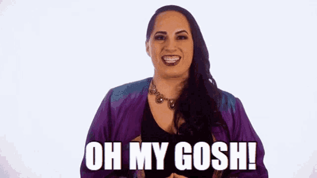 a woman in a purple kimono is making a funny face and saying `` oh my gosh '' .