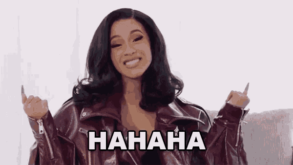 a woman in a leather jacket is laughing with her hands in the air and the words `` hahaha '' above her .