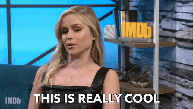 a woman says " this is really cool " in front of an imdb logo