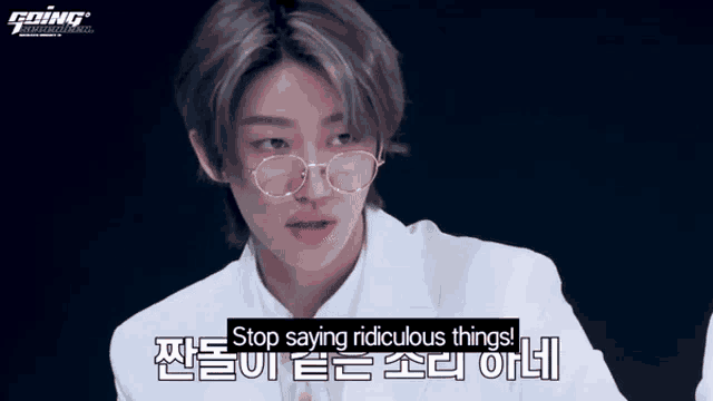 a young man wearing glasses and a white shirt says " stop saying ridiculous things "