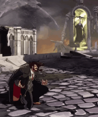 a man in a suit and tie is kneeling down in front of a statue