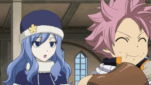 a boy and a girl are standing next to each other