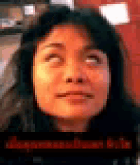 a close up of a woman 's face with her eyes closed and a red background .