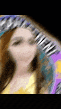 a blurry picture of a woman 's face with the word new visible