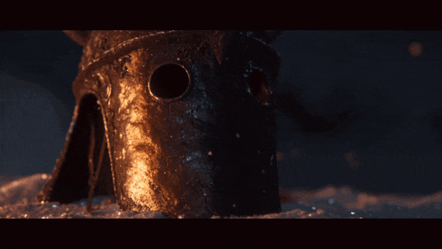 a close up of a helmet with a hole in the middle of it