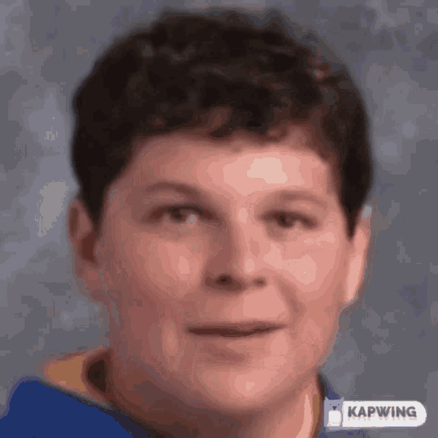 a close up of a person 's face with the word kapwing on the bottom right
