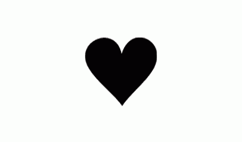 a black broken heart with a few pieces of tape on it .