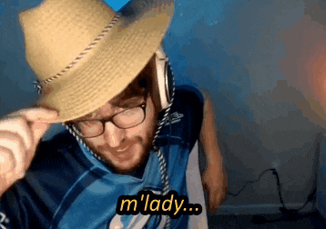 a man wearing a straw hat and glasses says " m lady "