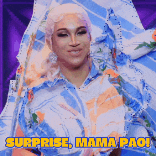 a picture of a drag queen with the words surprise mama pao on the bottom