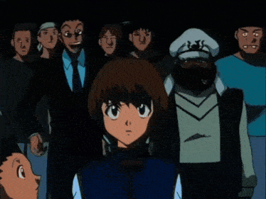 a group of people are gathered in a dark room and one of them is saying finally you spoke up