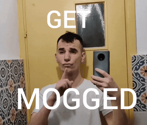 a man taking a selfie in front of a yellow door with the words get mogged below him