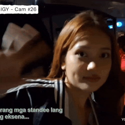 a close up of a woman 's face with the words rang mga standee lang g eksena on the bottom