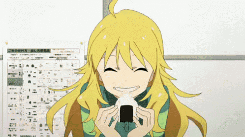 a girl with blonde hair is holding a piece of food in her hands
