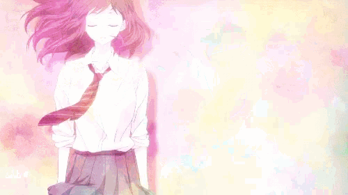 a close up of a girl 's face with her eyes closed