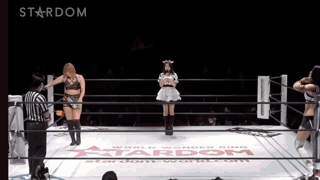 two women in a wrestling ring that says stardom on it