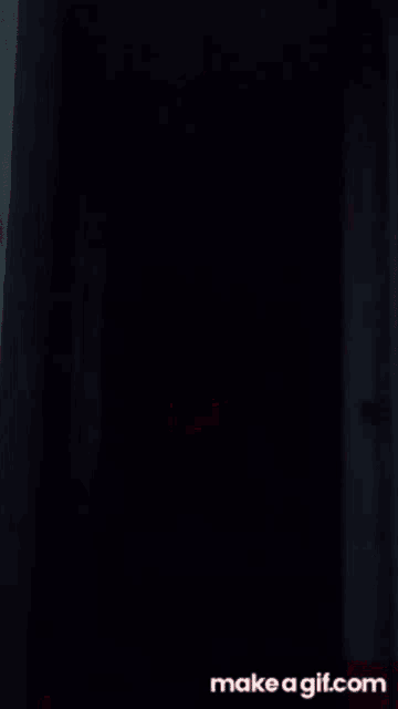 a man is holding a light saber in a hallway with the words cheez joined above him