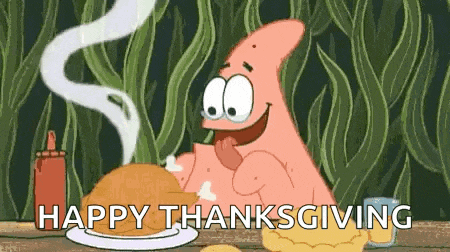 patrick star from spongebob squarepants is sitting at a table with a plate of food .