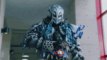 a statue of a monster with the word x-men on it