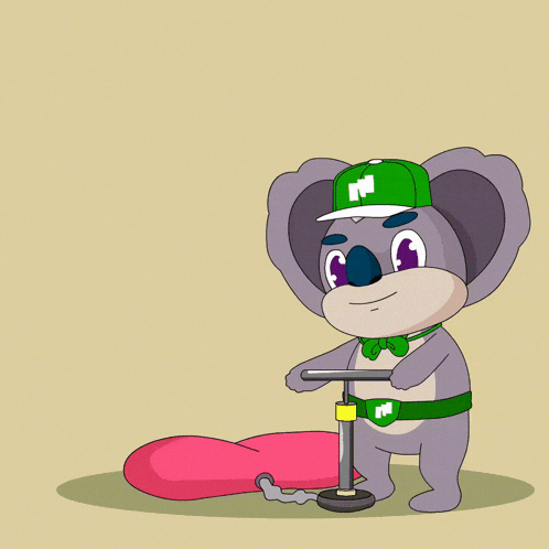 a koala bear wearing a green hat with the letter m on it pumps a heart shaped balloon