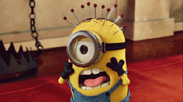 a cartoon minion with pins in his head making a face