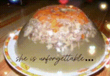 a plate of food with the words " she is unforgettable " on it
