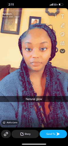 a woman 's face is shown on a snapchat app