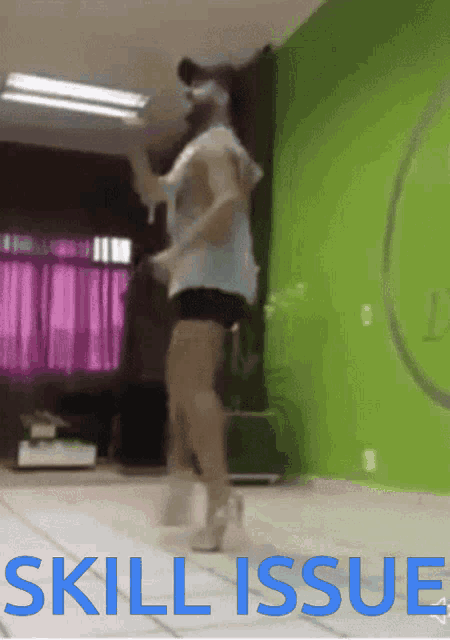 a blurred image of a person dancing with the words skill issue below