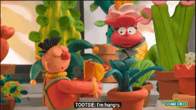 a sesame street cartoon shows a cartoon character named tootsie