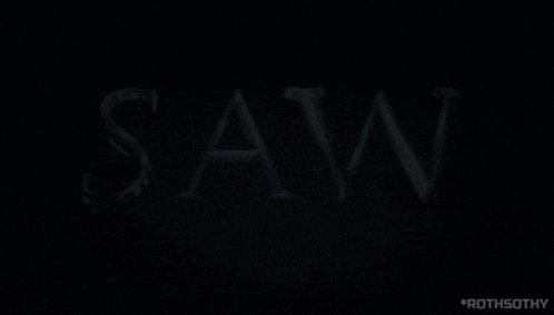 a dark background with the word saw in the foreground