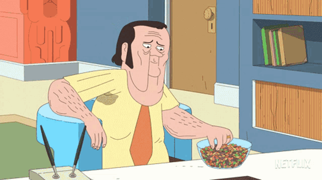 a cartoon of a man sitting at a desk with a bowl of fruity pebbles on it
